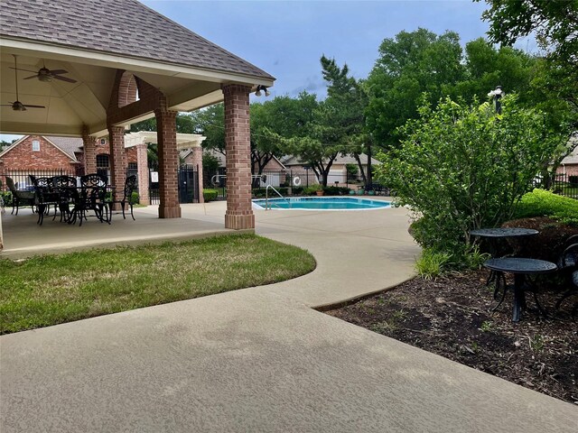 5033 Southpoint Dr, Arlington, TX 76017 - community pool with fence, ceiling fan, a patio, and a gazebo