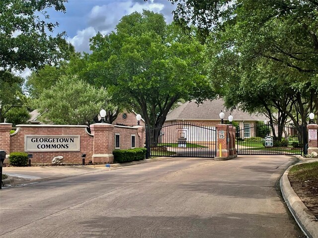 5033 Southpoint Dr, Arlington, TX 76017 - community / neighborhood sign with a gate and fence