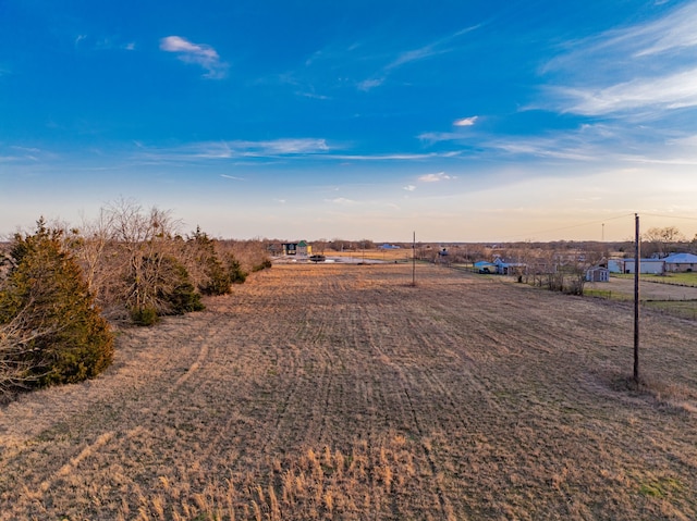 view of yard featuring a rural view