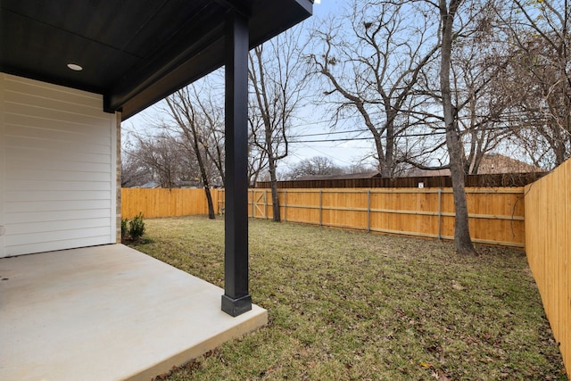 view of yard featuring a fenced backyard and a patio