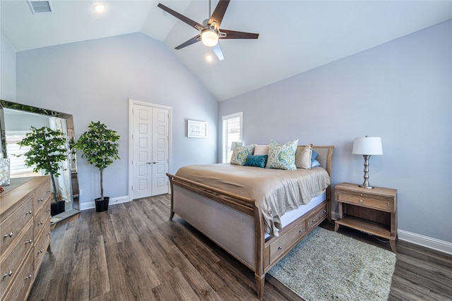 bedroom with high vaulted ceiling, dark wood-style flooring, visible vents, and baseboards