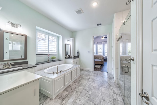 full bathroom featuring plenty of natural light, ensuite bath, and a shower stall