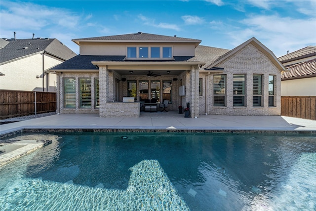 exterior space featuring a patio area, ceiling fan, a fenced backyard, and brick siding