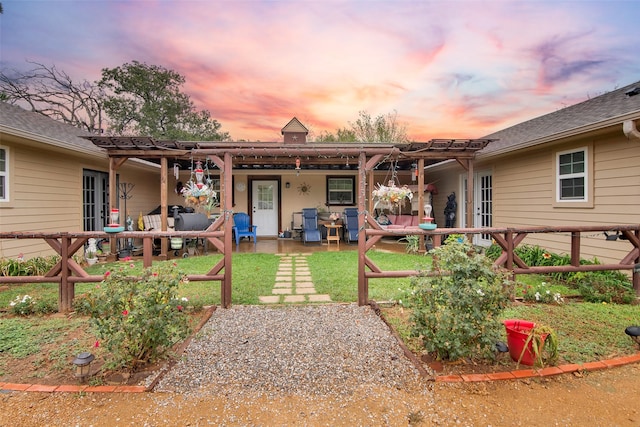 rear view of house featuring a patio
