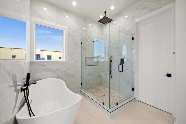 bathroom featuring recessed lighting, a sink, a soaking tub, a marble finish shower, and tile patterned floors