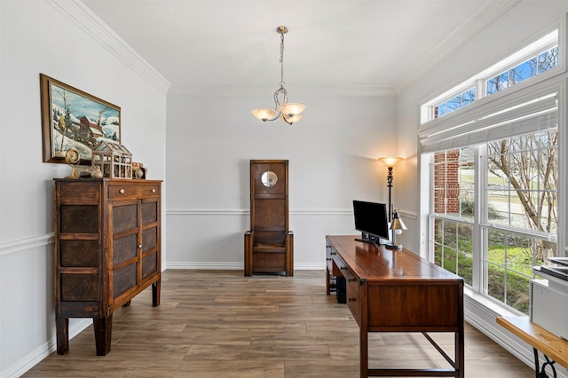 office space with crown molding, a notable chandelier, and a wealth of natural light