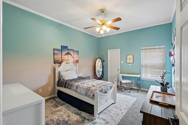 carpeted bedroom featuring baseboards, ornamental molding, and ceiling fan