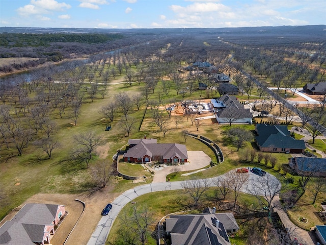 aerial view featuring a residential view and a forest view