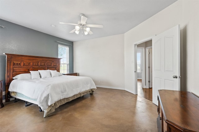 bedroom featuring a ceiling fan, carpet floors, and baseboards