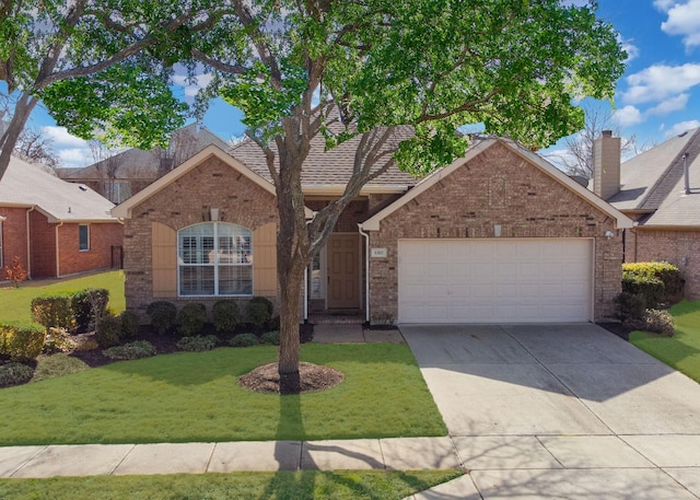 view of front of house featuring a garage, driveway, brick siding, and a front yard