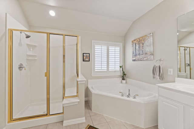 full bath featuring a garden tub, lofted ceiling, a stall shower, vanity, and tile patterned floors