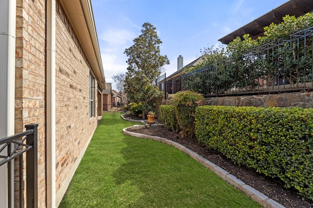 view of yard with fence