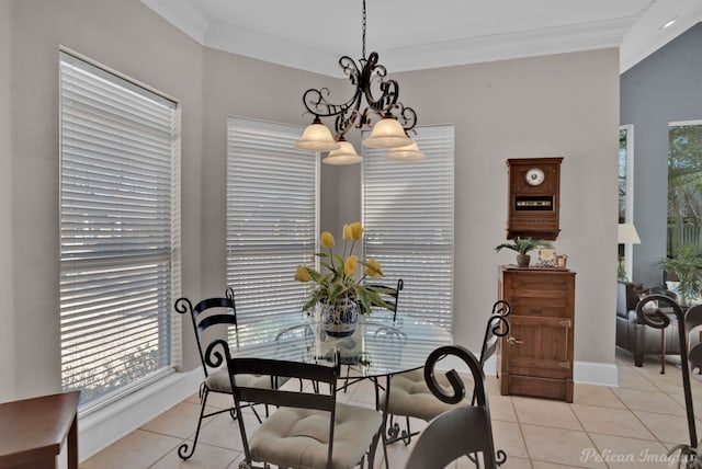 dining room featuring light tile patterned floors, baseboards, a chandelier, and crown molding