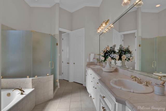 full bathroom featuring double vanity, ornamental molding, a stall shower, a sink, and tile patterned flooring