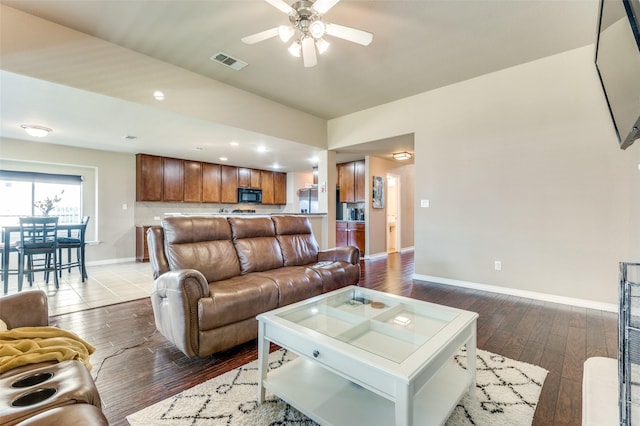 living area featuring dark wood finished floors, recessed lighting, visible vents, ceiling fan, and baseboards