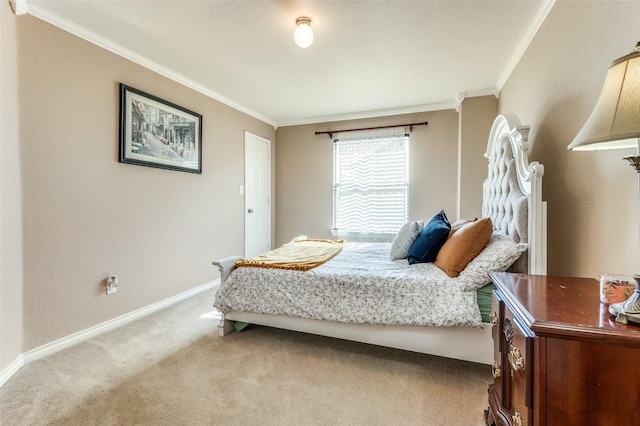 carpeted bedroom featuring ornamental molding and baseboards