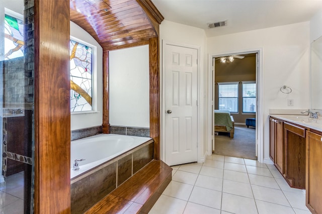 ensuite bathroom featuring visible vents, ensuite bath, tile patterned floors, vanity, and a bath