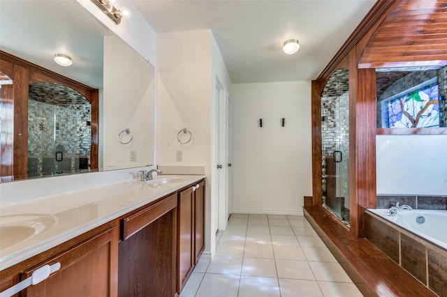 bathroom featuring double vanity, tile patterned floors, a garden tub, a shower stall, and a sink