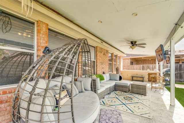 view of patio / terrace with ceiling fan and outdoor lounge area