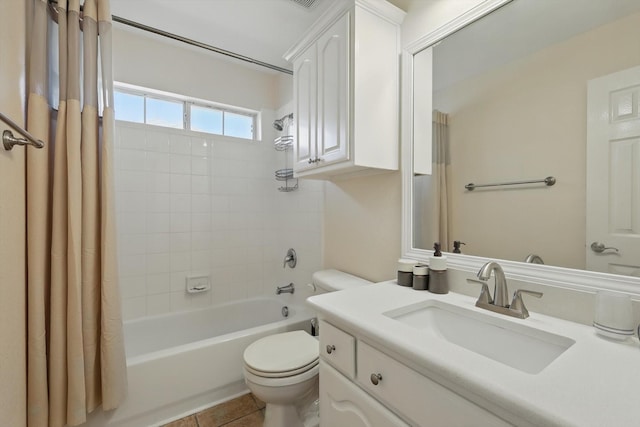 full bathroom with vanity, tile patterned flooring, toilet, and shower / bathtub combination with curtain