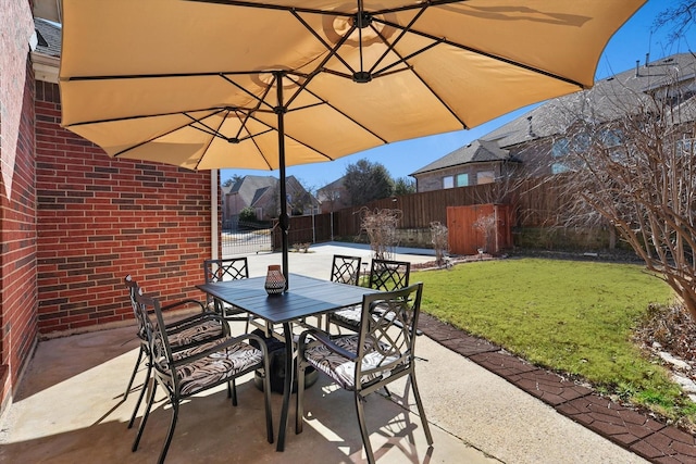 view of patio / terrace featuring outdoor dining area and a fenced backyard