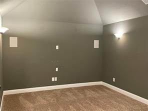 interior space with carpet flooring and baseboards