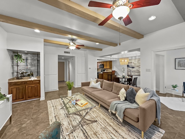 living area featuring recessed lighting, ceiling fan with notable chandelier, visible vents, baseboards, and beamed ceiling