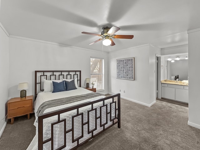 bedroom with baseboards, a ceiling fan, ornamental molding, ensuite bathroom, and dark colored carpet