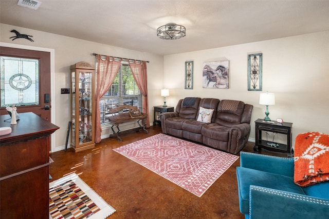 living room featuring baseboards and visible vents