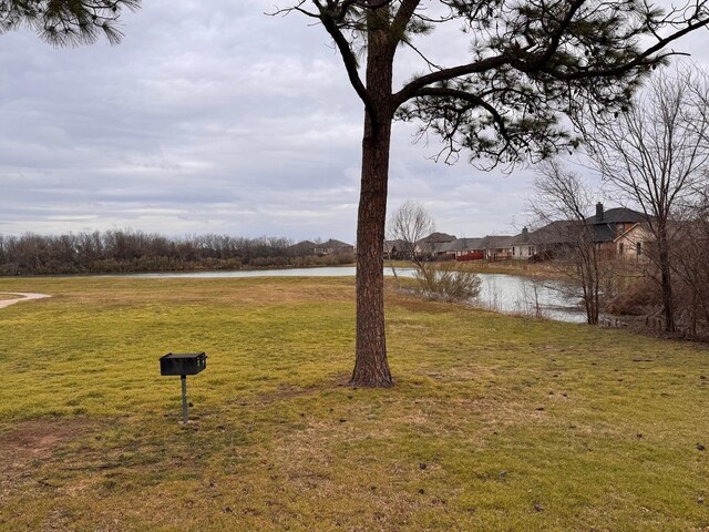 view of yard featuring a water view