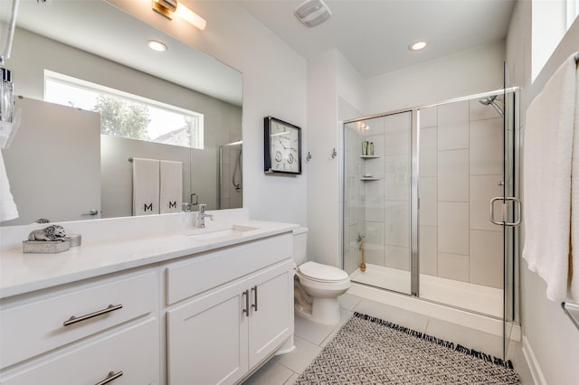 full bathroom featuring a stall shower, tile patterned flooring, visible vents, and toilet