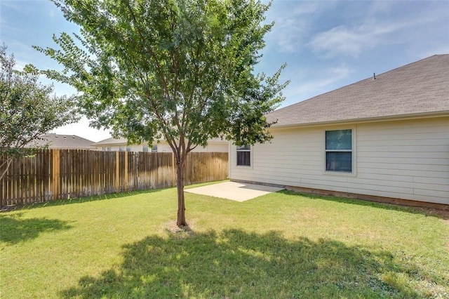 view of yard with a fenced backyard and a patio