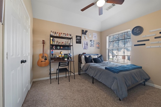 carpeted bedroom featuring a ceiling fan, a closet, visible vents, and baseboards