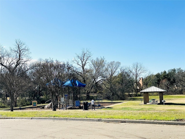 community playground with a lawn and a gazebo