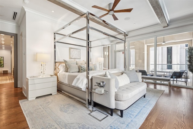 2300 Wolf St Unit 3D, Dallas, TX 75201 - bedroom featuring crown molding, visible vents, wood finished floors, and beamed ceiling