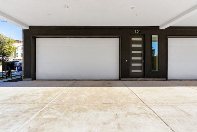 garage with driveway