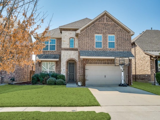 view of front of house with brick siding, a shingled roof, an attached garage, a front yard, and driveway