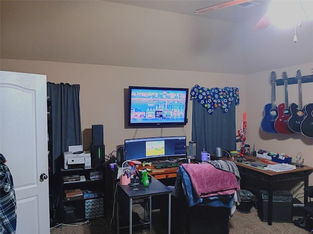 carpeted office featuring a ceiling fan