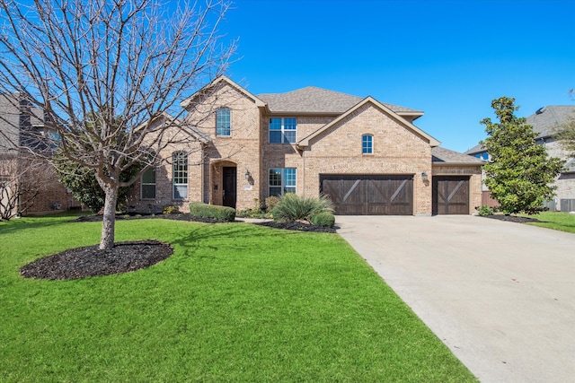 traditional home with brick siding, driveway, a front lawn, and roof with shingles