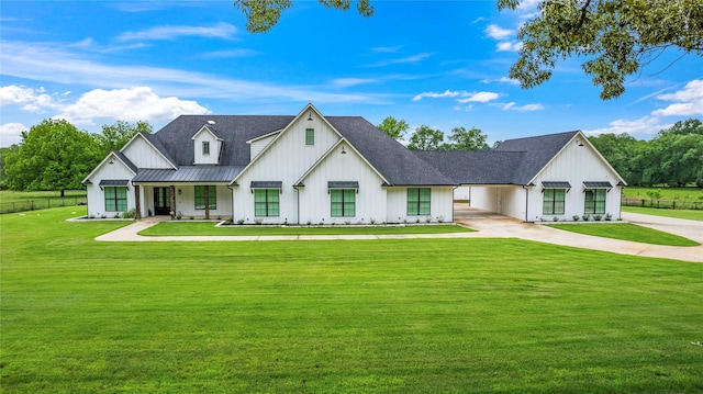 5949 County Road 137, Flint, TX 75762 - modern inspired farmhouse with board and batten siding, driveway, a standing seam roof, metal roof, and a carport