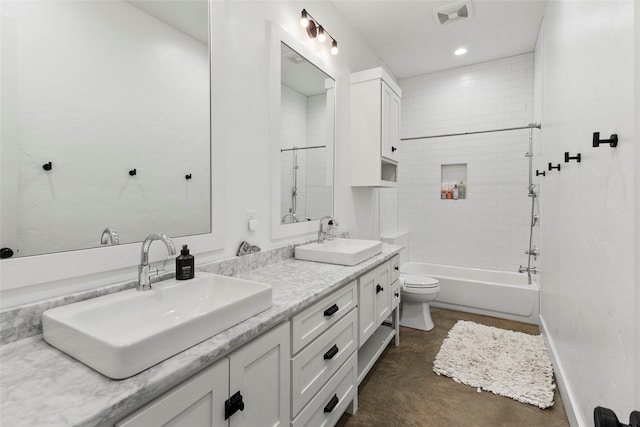 5949 County Road 137, Flint, TX 75762 - bathroom featuring double vanity, toilet, and recessed lighting