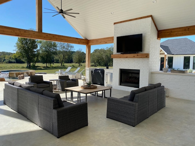 5949 County Road 137, Flint, TX 75762 - view of patio featuring an outdoor living space with a fireplace and ceiling fan