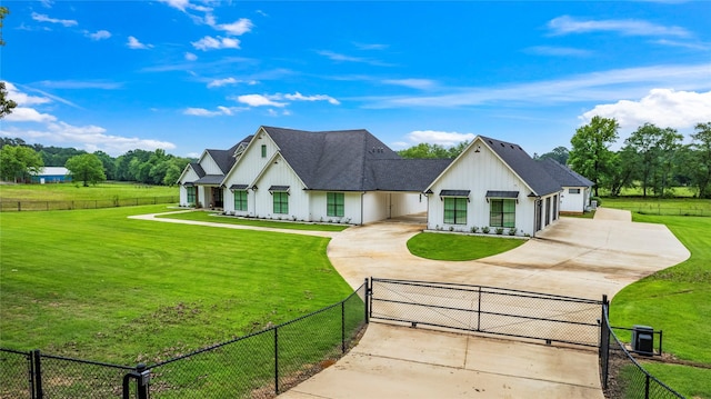 5949 County Road 137, Flint, TX 75762 - modern farmhouse with curved driveway, board and batten siding, and a gate
