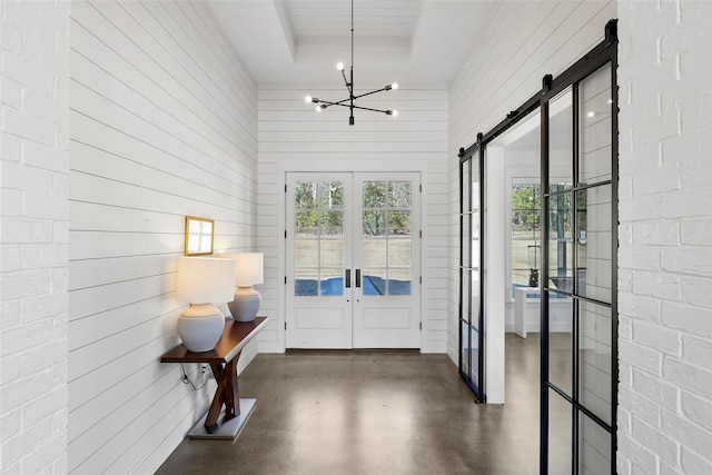 5949 County Road 137, Flint, TX 75762 - sunroom / solarium with french doors, a chandelier, and a barn door