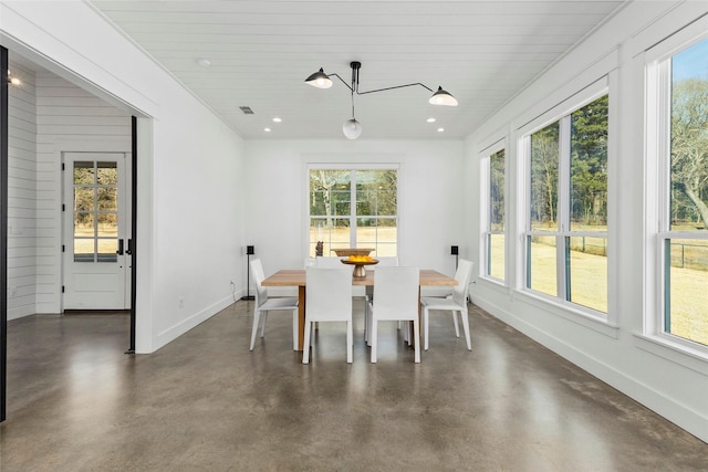 5949 County Road 137, Flint, TX 75762 - dining space with healthy amount of natural light, finished concrete floors, baseboards, wood ceiling, and recessed lighting