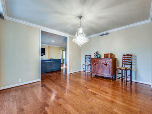 3525 Turtle Creek Blvd Unit 3D, Dallas, TX 75219 - dining room featuring ornamental molding, wood finished floors, a chandelier, and baseboards