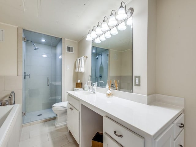 3525 Turtle Creek Blvd Unit 3D, Dallas, TX 75219 - full bath with a shower stall, tile patterned flooring, vanity, a tub to relax in, and toilet