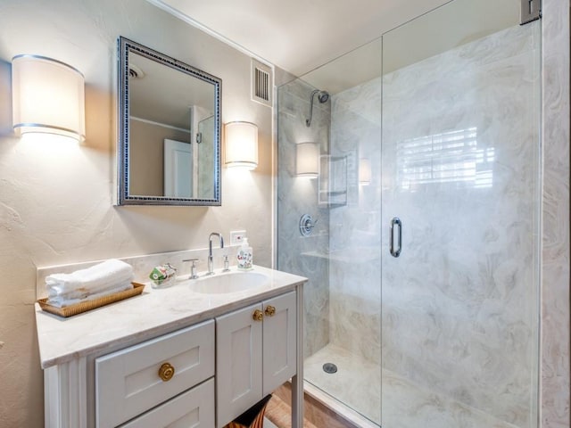 3525 Turtle Creek Blvd Unit 3D, Dallas, TX 75219 - full bathroom with a shower stall and vanity