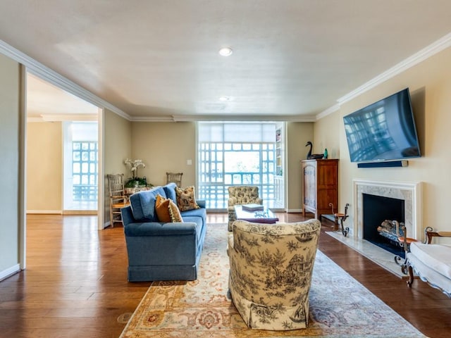 3525 Turtle Creek Blvd Unit 3D, Dallas, TX 75219 - living area featuring ornamental molding, dark wood-style floors, a fireplace, and baseboards