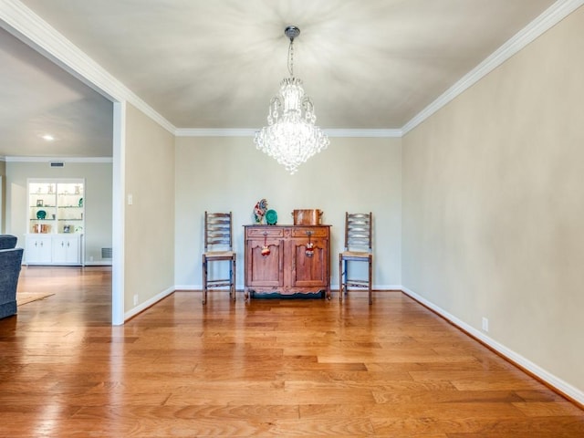 3525 Turtle Creek Blvd Unit 3D, Dallas, TX 75219 - dining area featuring ornamental molding, light wood finished floors, baseboards, and a chandelier